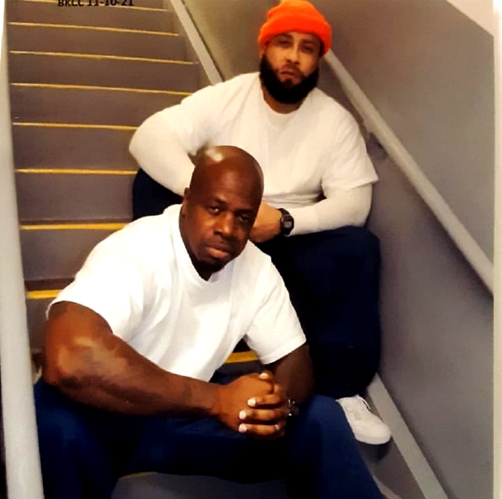 Jameed Jones seated with a Divaz and Conz teammate